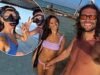 Andy Carroll sem camisa e Lou Teasdale de biquíni parecem apaixonados enquanto o casal compartilha suas fotos de férias em Zanzibar