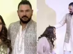 Hazel Keech conserta docemente a roupa de Yuvraj Singh